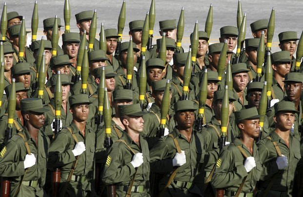 Cuban soldiers march during a military parade.