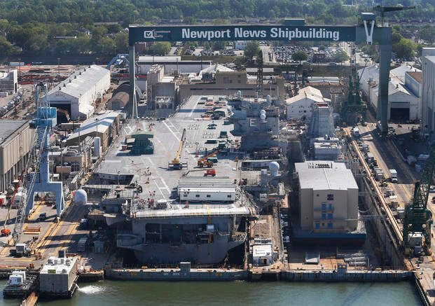 USS Enterprise, the oldest nuclear-powered aircraft carrier, is in dry dock at Newport News Shipbuilding in Newport News, Va.