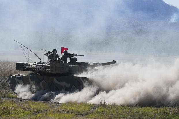 South Korean soldiers fire from a K1 tank during Exercise Talisman Sabre 2025, Australia's largest-ever war fighting drills at Shoalwater Bay Training Area