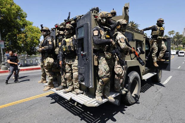 Federal immigration agents near MacArthur Park in the Westlake area.