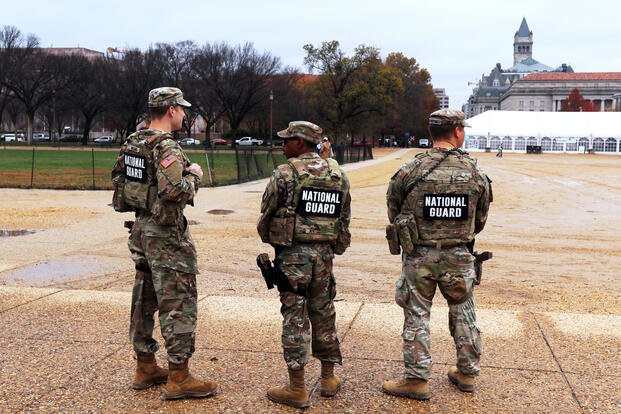 National Guard patrol on the National Mall near the U.S. Capitol.