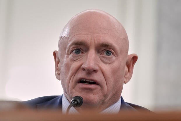 Sen. Mark Kelly, D-Ariz., speaks during a Senate Commerce, Science, Transportation nominations hearing on Capitol Hill Wednesday, Oct. 22, 2025, in Washington. (AP Photo/Mariam Zuhaib)