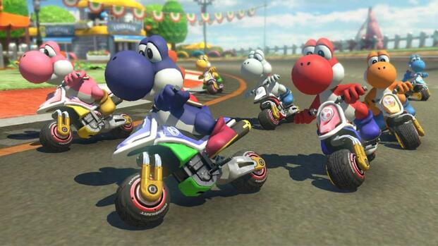 A bunch of Yoshis riding bikes - Mario Kart 8 Deluxe