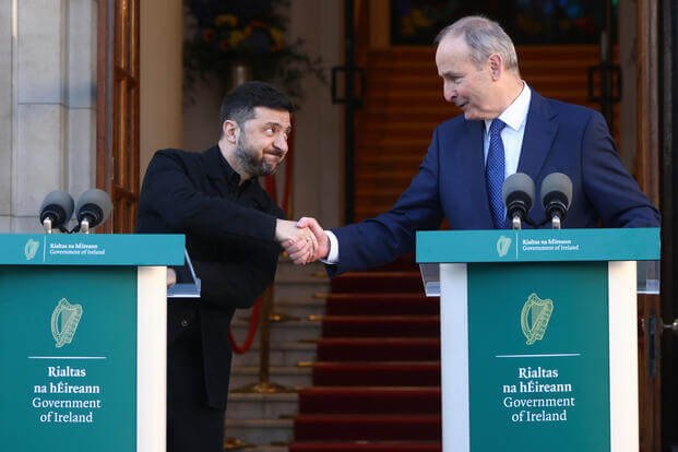 Ukraine President Volodymyr Zelenskyy, left, shakes hands with the Irish Prime Minister Micheal Martin as they hold a joint press conference in Dublin, Ireland, Tuesday, Dec. 2, 2025. (AP Photo/Peter Morrison)