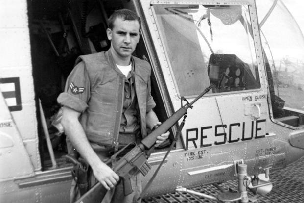 A1C William Pitsenbarger with an M-16 outside the HH-43, circa 1965.