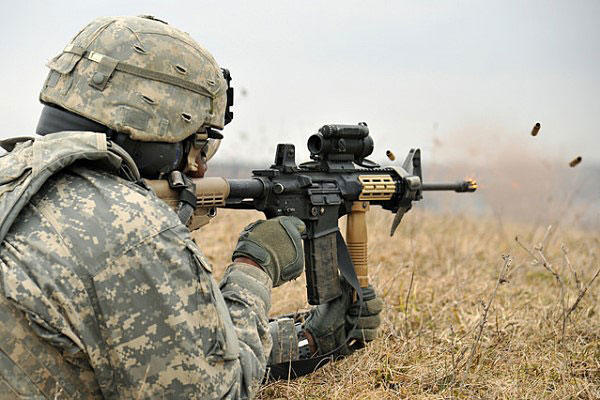 A U.S. Army soldier fires an M4. Army photo