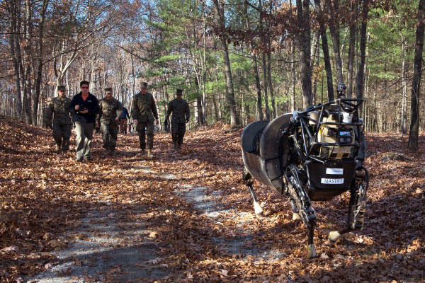 Marines with 1st Battalion, 5th Marine Regiment, test the capabilities of the Legged Squad Support System (LS3), aboard Fort Devens, Mass., Nov. 5, 2013. (U.S. Marine Corps photo by Sgt. Michael Walters/Released)