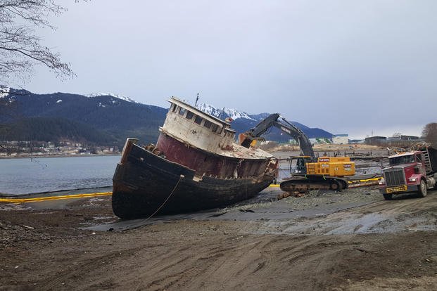 Workers begin destruction of the Tug Challenger on March 7, 2016, at the Rock Dump near downtown Juneau, Alaska. (Photo courtesy of Kerry Walsh)