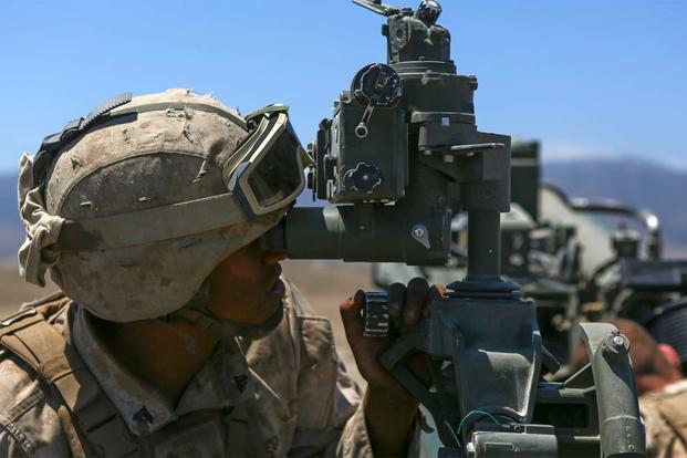 A Marine assigned to Company A, 1st Battalion, 11th Marine Regiment, 1st Marine Division, prepares an M777 howitzer to fire, at Marine Corps Base Camp Pendleton, June 17, 2015. (Marine Corps/ Cpl. William Perkins)