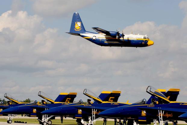 FILE -- The Blue Angels C-130, Fat Albert, takes a pass in front the crowd during the 2010 Airpower Over the Midwest Air Show on Sept. 11, 2010, at Scott Air Force Base, Ill. (U.S. Air Force/Staff Sgt. Brian Valencia)