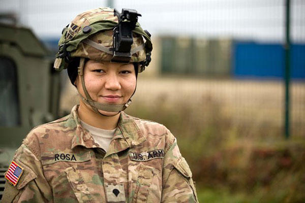 Soldiers serving in Germany discuss service and sacrifice as Veterans Day approaches. Here, Army Spc. Judy Mera Rosa prepares to perform maintenance checks at the Joint Multinational Readiness Center in Hohenfels, Germany. (Courtesy photo)