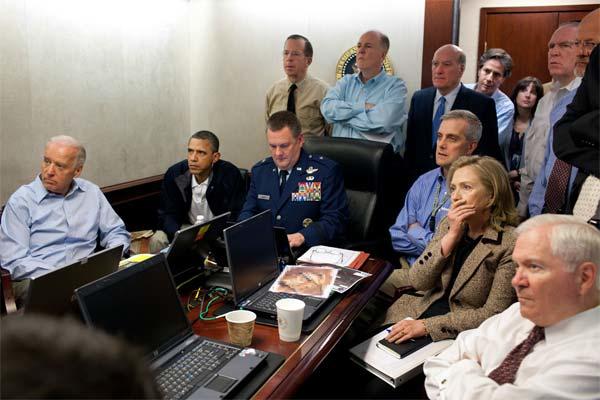 President Barack Obama and Vice President Joe Biden, along with members of the national security team, receive an update on the mission against Osama bin Laden in the Situation Room of the White House, Sunday, May 1, 2011 (White House)