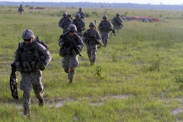 Infantrymen with 3rd Battalion, 15th Infantry Regiment, 2nd Infantry Brigade Combat Team, 3rd Infantry Division run to an objective at Fort Stewart, Georgia, June 24, 2015 (Army/Joshua Laidacker)