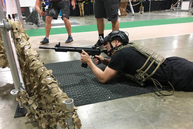 Sgt. Major of the Army Daniel Dailey participates in the first-ever Battle Challenge event at AUSA. (Military.com photo/Matthew Cox)