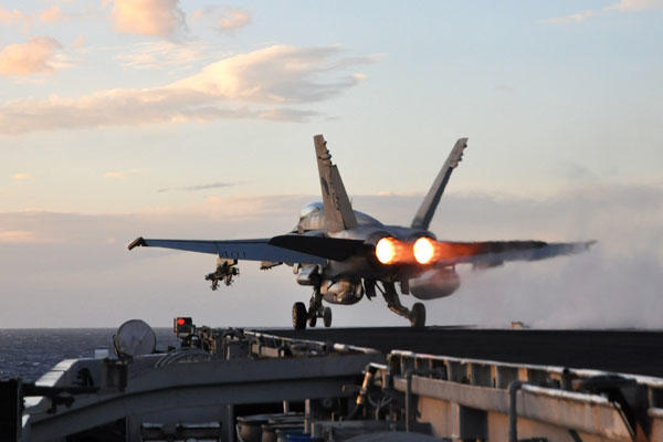 Navy officials said they plan to reduce deployments on aircraft carriers to eight months. (U.S. Navy photo)