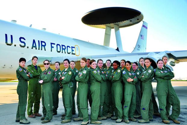 Airmen with the 552nd Air Control Wing and 513th Air Control Group pose for a photograph prior to making an historic all-female flight on Aug. 23. (Air Force photo by Darren D. Heusel)