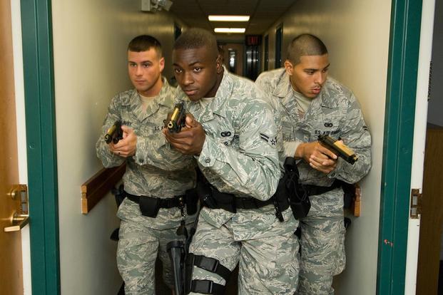 (From Left) Airman 1st Class Jeffrey Lavey, Airman 1st Class Nicholas Taylor, and Airman 1st Class Abraham Medina, all with the 66th Security Forces Squadron, during training session with the Massachusetts State Police. (U.S. Air Force/Rick Berry)