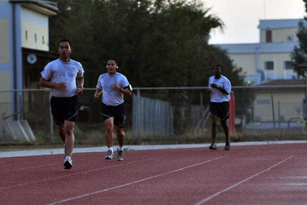 Airmen, sprint during the running improvement program at the track Sept. 28, 2012, at Incirlik Air Base, Turkey. (U.S. Air Force/Senior Airman Daniel Phelps)