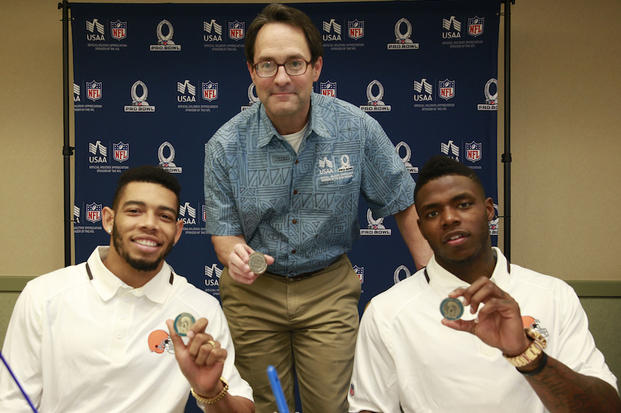 Cleveland Browns CB Joe Haden, Vice Admiral John Bird from USAA, and Cleveland Browns WR Josh Gordon (L to R)