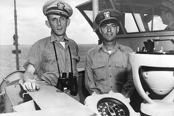 Captain Daniel Gallery (L) and Lt. Albert L. David on the bridge of the of the USS Guadacanal (CVE-60). David led the boarding party on the U-505 a German U-boat at sea in the Atlantic in June 1944. The photo was taken just after the capture. (U.S. Navy)
