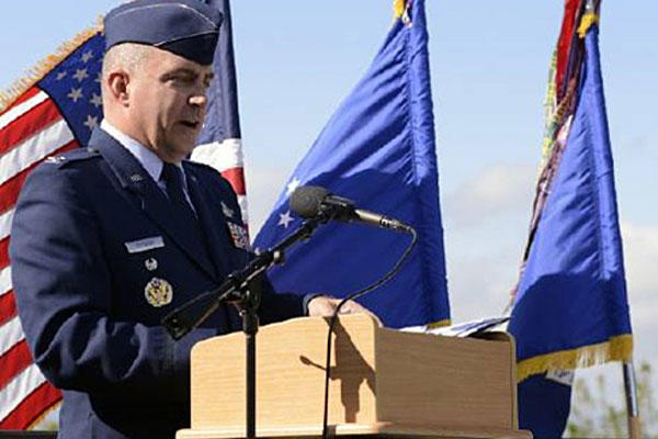 Col. Eugene Caughey speaks at a 9/11 commemoration in 2014 at Schriever Air Force Base, Colo. Air Force photo