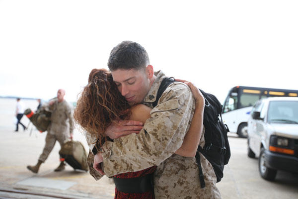 Hug for service member returning home