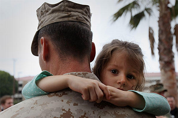 Talking to your military child about feelings can help both of you feel better. Sgt. Heidi E. Agostini/Marine Corps