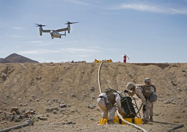 Marines with Marine Medium Tiltrotor Squadron (VMM) 363 conduct an air delivery ground refueling (ADGR) exercise at a Marine Wing Support Squadron (MWSS) 373 field aircraft refueling point (FARP) during Integrated Training Exercise (ITX) 3-17, at Marine Corps Air Ground Combat Center Twentynine Palms, Calif., May 30. ITX is a combined-arms exercise enabling Marines across 3rd Marine Aircraft Wing to operate as an aviation combat element integrated with ground and logistics combat elements as a Marine air-gr