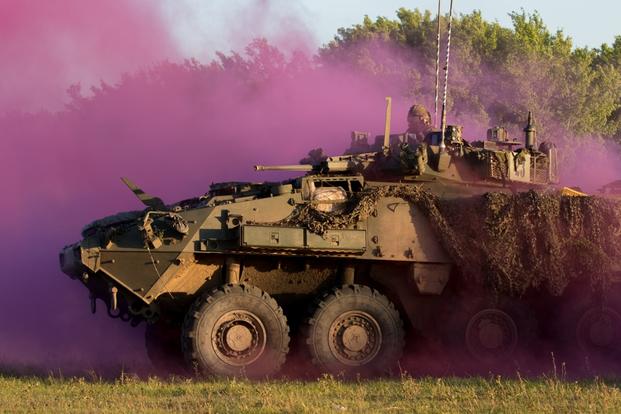 Canadian soldiers from 1st Battalion, The Royal Canadian Regiment, Bravo Company, advance on a town held by 1st Battalion The Royal Canadian Regiment, Dukeâs Company during a simulated battle in Exercise Maple Resolve 17 at Camp Wainwright in Alberta, Canada, May 28, 2017. Exercise Maple Resolve is an annual collective training event designed for any contingency operation. Approximately 4,000 Canadian and 1,000 service members from the U.S., Britain, Australia, New Zealand, and France are participating in