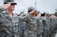 The all-female formation salutes during the national anthem at the base retreat ceremony at Eglin Air Force Base, Fla., March 30, 2017. (U.S. Air Force photo/Samuel King Jr.)