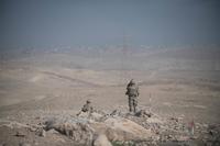 U.S. Army soldiers assigned to 2nd Battalion, 325th Airborne Infantry Regiment, 2nd Brigade Combat Team, 82nd Airborne Division, overlook the city of Mosul while manning a mortar fire position on Feb. 28, 2017. (U.S. Army photo by Staff Sgt. Alex Manne)