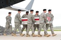 Staff Sgt. Michael Simpson's casket is offloaded from a plane in 2013. Courtesy of Krista Simpson Anderson