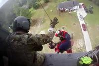 Members of the 106th Rescue Squadron, 106th Rescue Wing, New York Air National Guard, drop from an HH-60 Pavehawk during a rescue mission during Hurricane Florence, Sept. 17, 2018.(U.S. Air Force/Senior Airman Kyle Hagan)