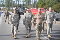 Pennsylvania National Guard members are escorted by emergency responders to the Horry County emergency operations center in Conway, South Carolina, on Sept. 17, 2018, after Hurricane Florence. Pennsylvania National Guardsmen will be the first to see the Army's new mobile pay system roll out. Photo by Capt. Travis Mueller/Pennsylvania National Guard