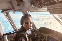 Coast Guard Lt. Ronaqua Russell flies an Air Station Corpus Christi HC-144 in support of Hurricane Maria response efforts in October 2018. (Ryan P Kelley/U.S. Coast Guard)