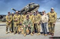 Team American Freedom with the historic C-47 Tico Bell in the background. (Photo courtesy of Q Concepts)
