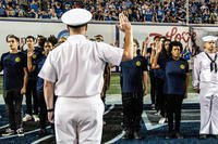 A sailor administers the oath of enlistment.