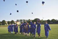 students in graduation caps and gowns