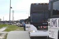 Buses arrive at Fort Jackson, South Carolina to take Soldiers to Fort Lee.