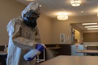 Members of the National Guard disinfect Bill Nichols State Veterans Home in Alexander City, Alabama.