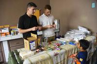 U.S. Army medical personnel distribute vitamins during a nutritional assessment in Honduras.