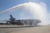 A KC-10 Extender receives a water salute at a July 13, 2020 ceremony at Joint Base McGuire-Dix-Lakehurst.