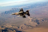 An F-16 Fighting Falcon over the test range at Holloman Air Force Base, New Mexico.