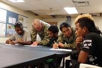 Group of military members studying for ASVAB