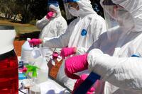 An Infection Control Team disinfects a senior living facility in Woodstock, Ga.