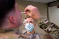 U.S. Air Force airman oversees COVID-19 testing.