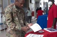 A U.S. soldier votes in Kuwait.