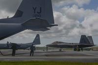 An F-22 Raptor completes a hot refuel.