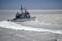 USS Chancellorsville (CG 62) conducts a high-speed turn