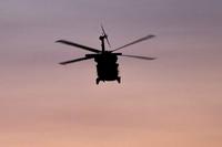 Idaho Army National Guard crewmembers fly a UH-60 Black Hawk